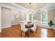 Formal dining room featuring hardwood floors and a large window at 14822 Rocky Top Dr, Huntersville, NC 28078