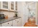 Charming butler's pantry with granite countertops and ample cabinet space at 14822 Rocky Top Dr, Huntersville, NC 28078