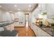 Beautiful kitchen featuring white cabinets, stainless steel appliances, and granite countertops at 14822 Rocky Top Dr, Huntersville, NC 28078