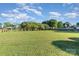 Expansive green backyard featuring a wooden fence and plenty of green space at 150 Northchase Dr, Concord, NC 28027