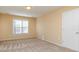 Neutral bedroom has carpet, trim, and walls and a window for natural light at 150 Northchase Dr, Concord, NC 28027