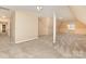 Bright and spacious carpeted bonus room featuring neutral walls, ample lighting, and dormer windows at 150 Northchase Dr, Concord, NC 28027