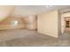 Large bonus room with ample lighting and natural light from the window at 150 Northchase Dr, Concord, NC 28027