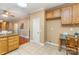 Kitchen featuring granite countertops and an adjacent desk at 150 Northchase Dr, Concord, NC 28027