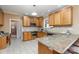 Bright kitchen featuring wooden cabinetry, granite countertops, and stainless steel appliances at 150 Northchase Dr, Concord, NC 28027