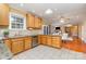 Well-lit kitchen featuring granite countertops, stainless steel appliances, and ample cabinet space at 150 Northchase Dr, Concord, NC 28027