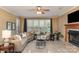 Inviting living room showcasing a fireplace, comfortable seating, and plenty of natural light at 150 Northchase Dr, Concord, NC 28027