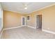 Versatile bonus room with neutral walls and tile flooring, great for entertaining at 150 Northchase Dr, Concord, NC 28027