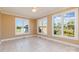 Spacious room with large windows offering bright natural light and scenic backyard views at 150 Northchase Dr, Concord, NC 28027