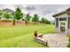 Expansive backyard with lush green grass and stone accents providing a peaceful retreat at 15927 Vale Ridge Dr, Charlotte, NC 28278