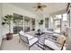 Outdoor living space features stylish furnishings, a ceiling fan, and easy access to the backyard at 15927 Vale Ridge Dr, Charlotte, NC 28278