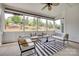 Covered patio perfect for relaxing, featuring comfortable seating and scenic backyard views at 15927 Vale Ridge Dr, Charlotte, NC 28278