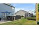 Backyard featuring a hot tub, outdoor furniture and a trampoline with safety net at 1620 Callahan Rd, Fort Mill, SC 29715