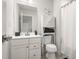 Well-lit bathroom featuring a vanity with a sink and a separate storage cabinet at 1620 Callahan Rd, Fort Mill, SC 29715