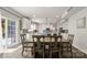 Open concept kitchen with a wooden dining table and chairs and a sliding glass door at 1620 Callahan Rd, Fort Mill, SC 29715