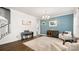 Cozy living room with neutral rug, piano, modern decor, and seamless access to the kitchen area at 1620 Callahan Rd, Fort Mill, SC 29715
