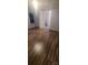 Spacious bedroom featuring wood-look flooring and a bathroom ensuite at 181 Trivette Rd, Harmony, NC 28634