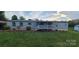Inviting single-story home with a covered front porch and lush green lawn at 181 Trivette Rd, Harmony, NC 28634