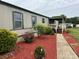 Charming single-story home featuring a cozy front porch and well-maintained landscaping at 181 Trivette Rd, Harmony, NC 28634