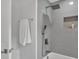 Bright shower with new fixtures, tile, and built-in storage at 1829 Jennings St, Charlotte, NC 28216