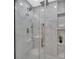 Modern shower with double shower heads, a glass enclosure, and built-in shelves at 1829 Jennings St, Charlotte, NC 28216