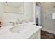 Elegant bathroom with marble countertop, sleek faucets, and a frameless glass shower at 1915 Winthrop Ave, Charlotte, NC 28203