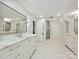 Spacious bathroom with white marble countertops, modern fixtures, and a glass shower at 1915 Winthrop Ave, Charlotte, NC 28203