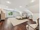 Expansive bedroom featuring dark hardwood floors, neutral colors and natural light at 1915 Winthrop Ave, Charlotte, NC 28203