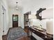Bright foyer featuring hardwood floors, console table with lamps, and stylish decor at 1915 Winthrop Ave, Charlotte, NC 28203