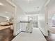Bright hallway with hardwood floors, white trim, and stylish lighting at 1915 Winthrop Ave, Charlotte, NC 28203