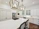 Spacious kitchen with stainless steel appliances, and pendant lights at 1915 Winthrop Ave, Charlotte, NC 28203