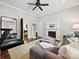 Cozy living room with neutral tones, fireplace, and hardwood floors at 1915 Winthrop Ave, Charlotte, NC 28203