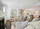 Inviting living room with hardwood floors and an open layout leading into kitchen at 1915 Winthrop Ave, Charlotte, NC 28203
