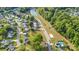 Overhead view showcases the community's layout, including the pond, playground, and pool at 197 Devon Forest Dr, Mooresville, NC 28115