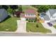 An aerial view showcases the home's landscaping, driveway, and surrounding neighborhood at 197 Devon Forest Dr, Mooresville, NC 28115
