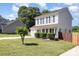 Inviting home with manicured lawn, fresh mulch and established shrubs at 197 Devon Forest Dr, Mooresville, NC 28115