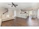 Spacious living room featuring hardwood floors, open to the kitchen and dining area at 197 Devon Forest Dr, Mooresville, NC 28115