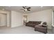 Spacious bonus room offering flexible living space with neutral carpet and a ceiling fan at 2014 Drawbridge Dr, Fort Mill, SC 29707