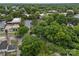 A captivating aerial view of the property nestled within a lush, green neighborhood at 207 Eden St, Davidson, NC 28036