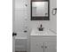 Modern bathroom with a vanity, tub, and sleek fixtures, offering a spa-like experience at 207 Eden St, Davidson, NC 28036