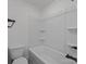 Clean bathroom with a modern tub and neutral colors offering a comfortable space at 207 Eden St, Davidson, NC 28036