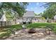 Large backyard with deck, fire pit, and fenced in yard at 20840 Sierra Vista Dr, Cornelius, NC 28031