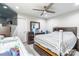 Comfortable bedroom featuring a ceiling fan, flatscreen TV, and modern furniture at 211 E Mcneely Ave, Mooresville, NC 28115