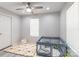 Bright bedroom with a ceiling fan at 211 E Mcneely Ave, Mooresville, NC 28115