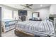 Comfortable bedroom featuring a ceiling fan, flatscreen TV, and modern furniture at 211 E Mcneely Ave, Mooresville, NC 28115
