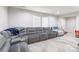 Bright living space features a plush sectional sofa, neutral walls, and ample natural light at 211 E Mcneely Ave, Mooresville, NC 28115
