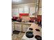 Functional kitchen with white cabinets, contrasting countertops and modern appliances is perfect for preparing any meal at 2224 Yorkhills Dr # 7, Charlotte, NC 28217