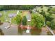 Stunning aerial view of the property showing waterfront location and beautiful landscaping at 235 Pebble Point Rd, Salisbury, NC 28146