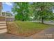 Enjoy outdoor living in this home's backyard leading to the water at 235 Pebble Point Rd, Salisbury, NC 28146