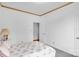 Bedroom featuring neutral decor, plush carpet, and a comfortable bed with floral bedding at 235 Pebble Point Rd, Salisbury, NC 28146